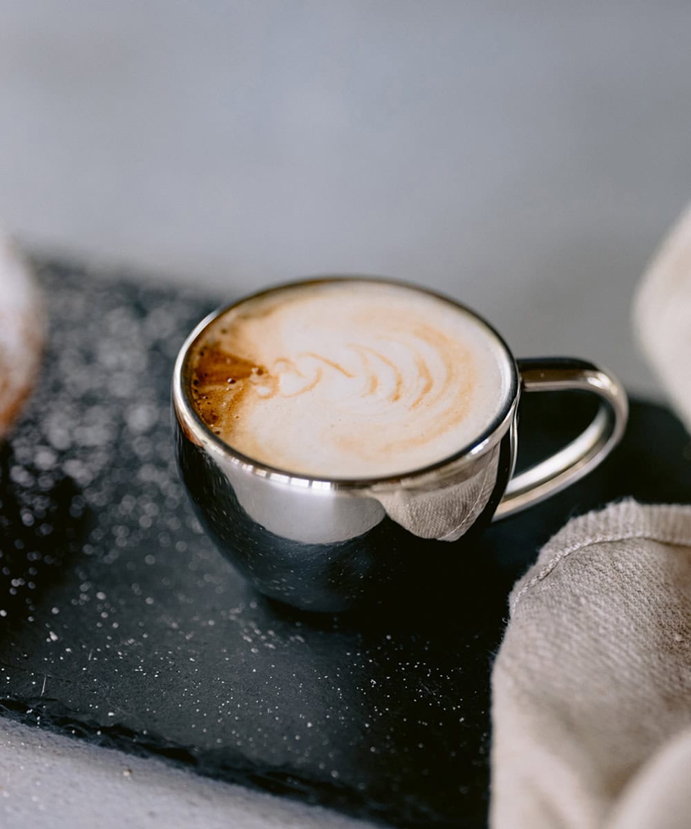 a cup of espresso at Milk House invites guests to savor simple pleasures