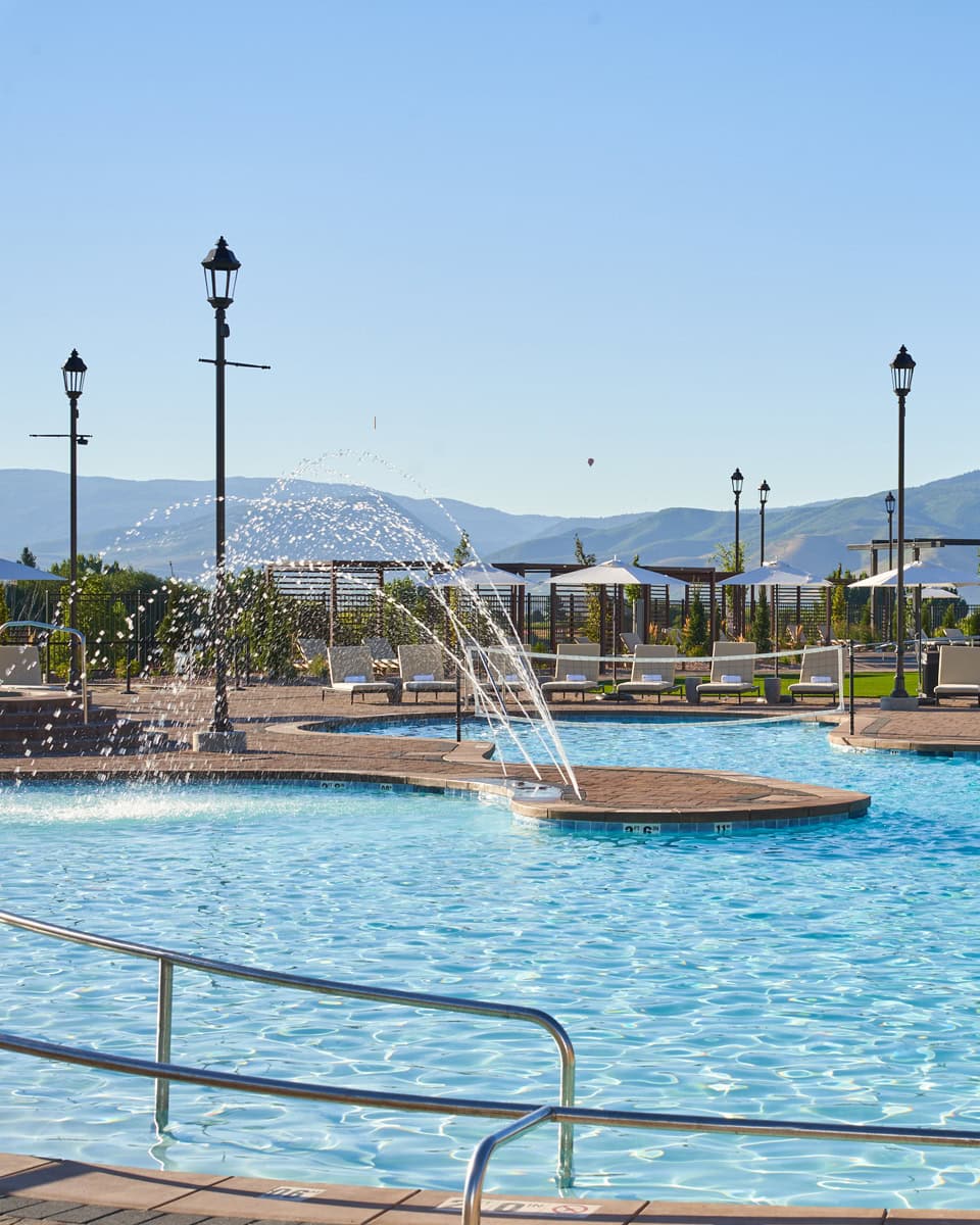 sunlight shimmers on the world-class resort's outdoor pool
